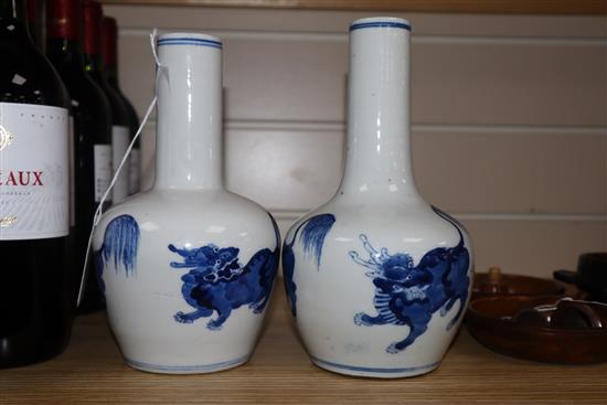 A pair of Chinese blue and white bottle vases tallest 22cm